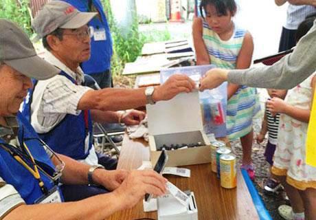 夏祭りでの実施風景。4000名の来場者のうち500名にご利用いただきました